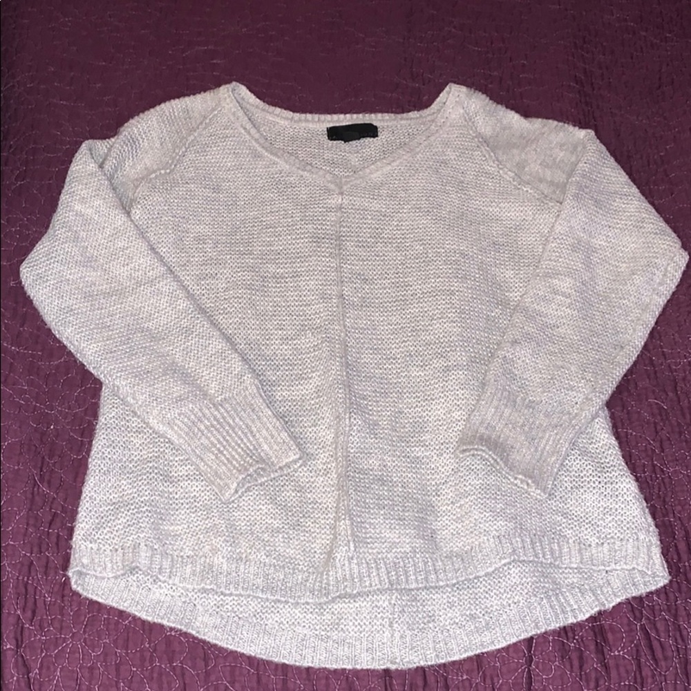 Light grey V-neck sweater